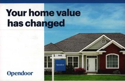 Home valuation direct mail example: Opendoor home-value-change self-mailer. Two-page blue self-mailer, changed-home-value headline, property photography, and online response.